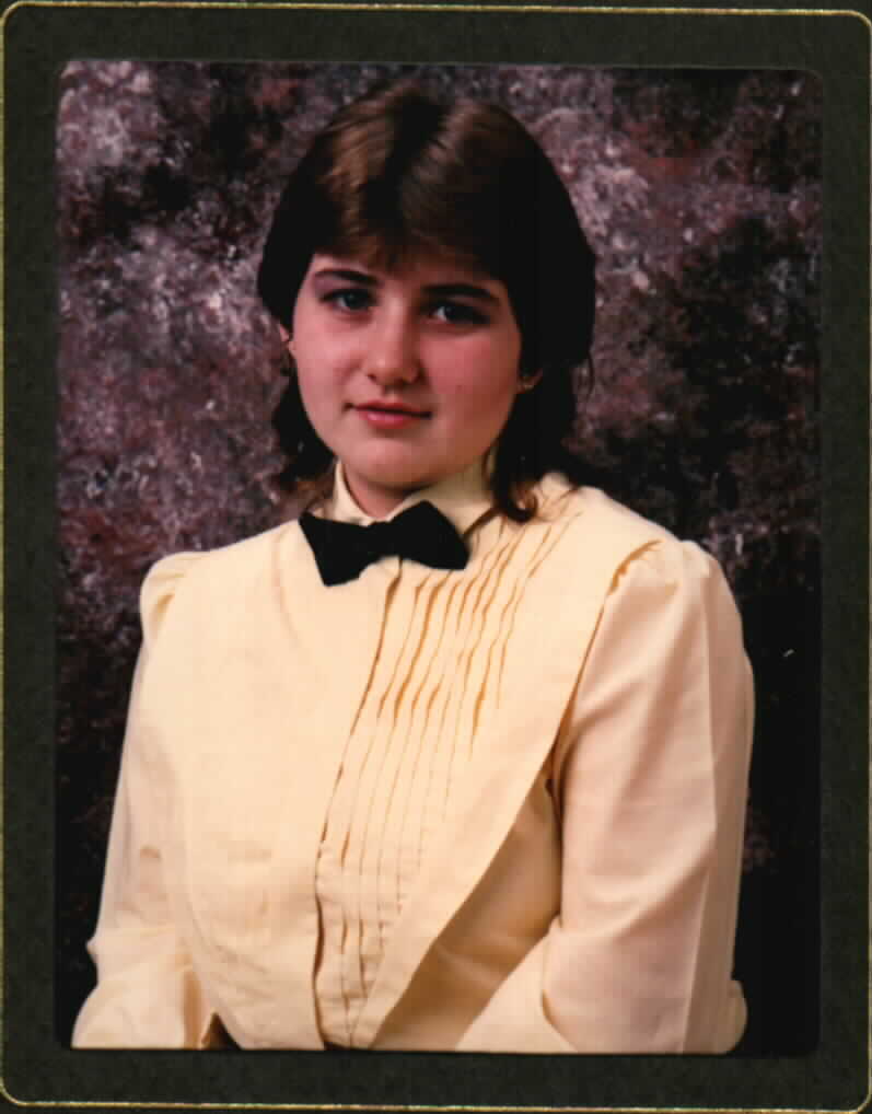 I'm 15 in my high school graduation photo--cute, huh?